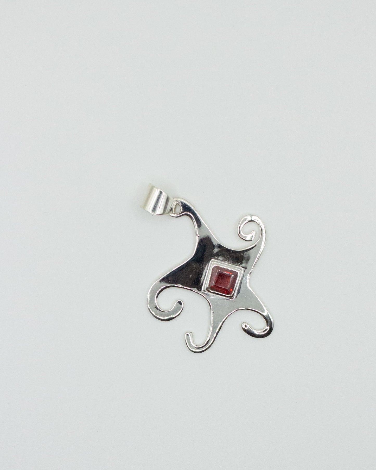 Garnet Whimsical Star Pendant
