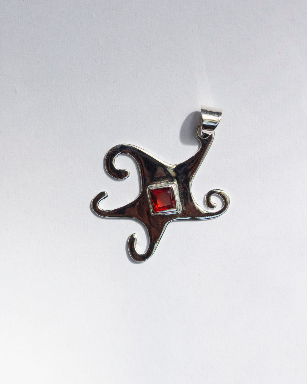 Garnet Whimsical Star Pendant
