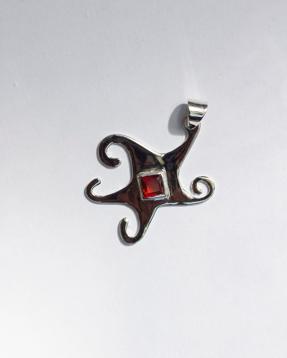 Garnet Whimsical Star Pendant