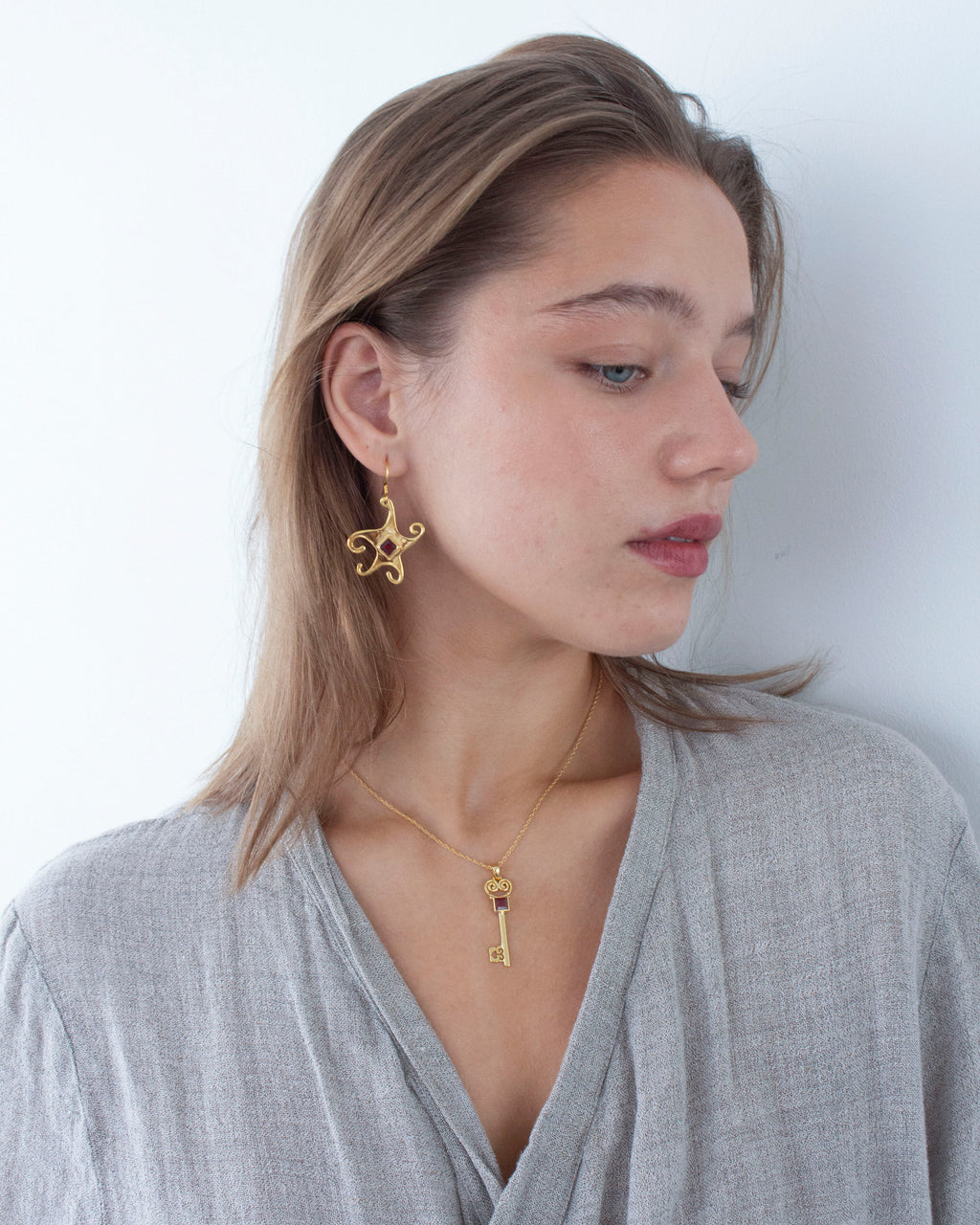 Gold Whimsical Star Earrings